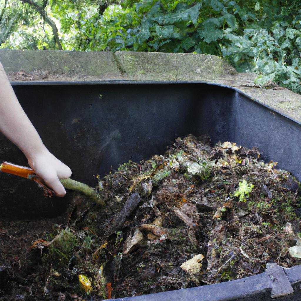 Person composting in a garden